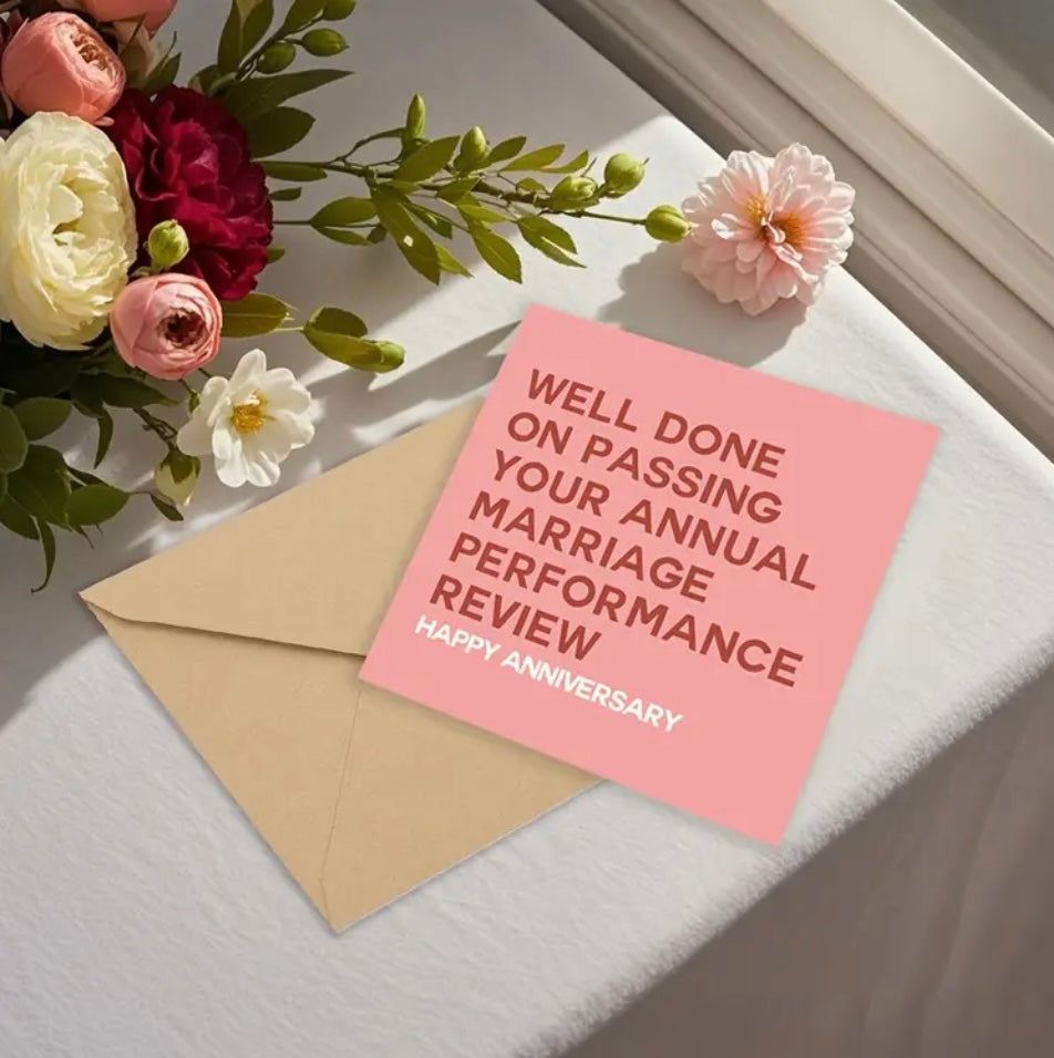 Funny pink anniversary card with envelope and flowers