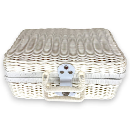 White keepsake suitcase baby hamper, closed and ready to gilt, designed as a premium newborn gift.