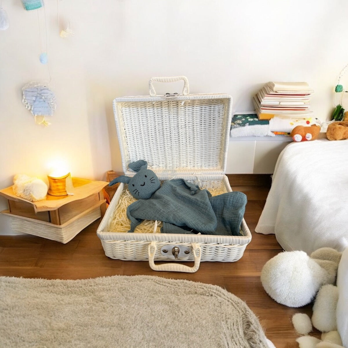 Adorable blue bunny blanket in a wooden basket