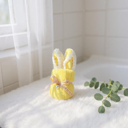 Soft mustard mini baby washcloth with bunny-ear fold and ribbon detail, soft and washcloth for newborn bath time and gifts