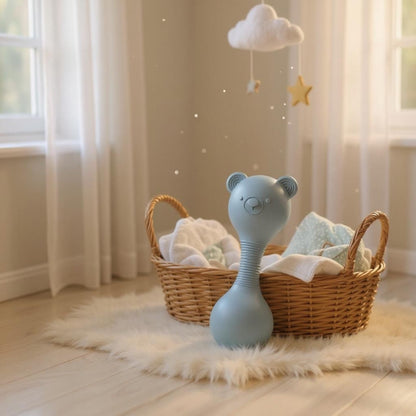 Silicone bear rattle displayed in nursery setting, gentle sound baby activity toy