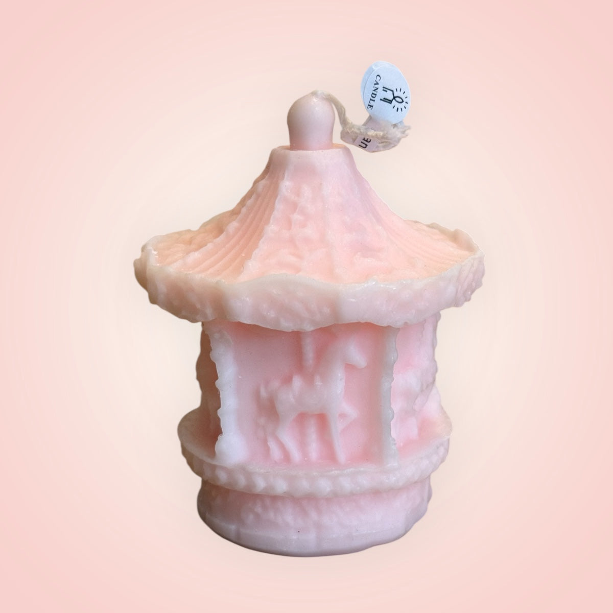 Pink carrousel ideal for a baby shower gift