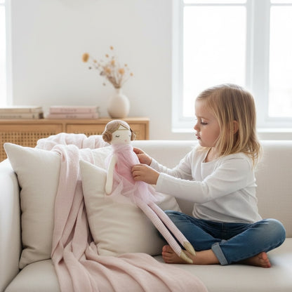 Soft blush doll used for gentle supervised play in a nursery setting