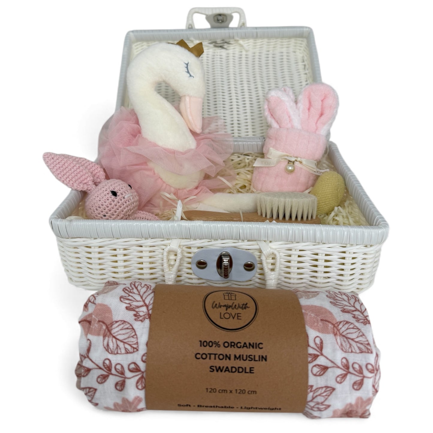Luxury baby girls gift hamper with muslin swaddle, swan plush toy, crochet rattle, baby brush, bunny face washer and keepsake suitcase, beautifully presented.