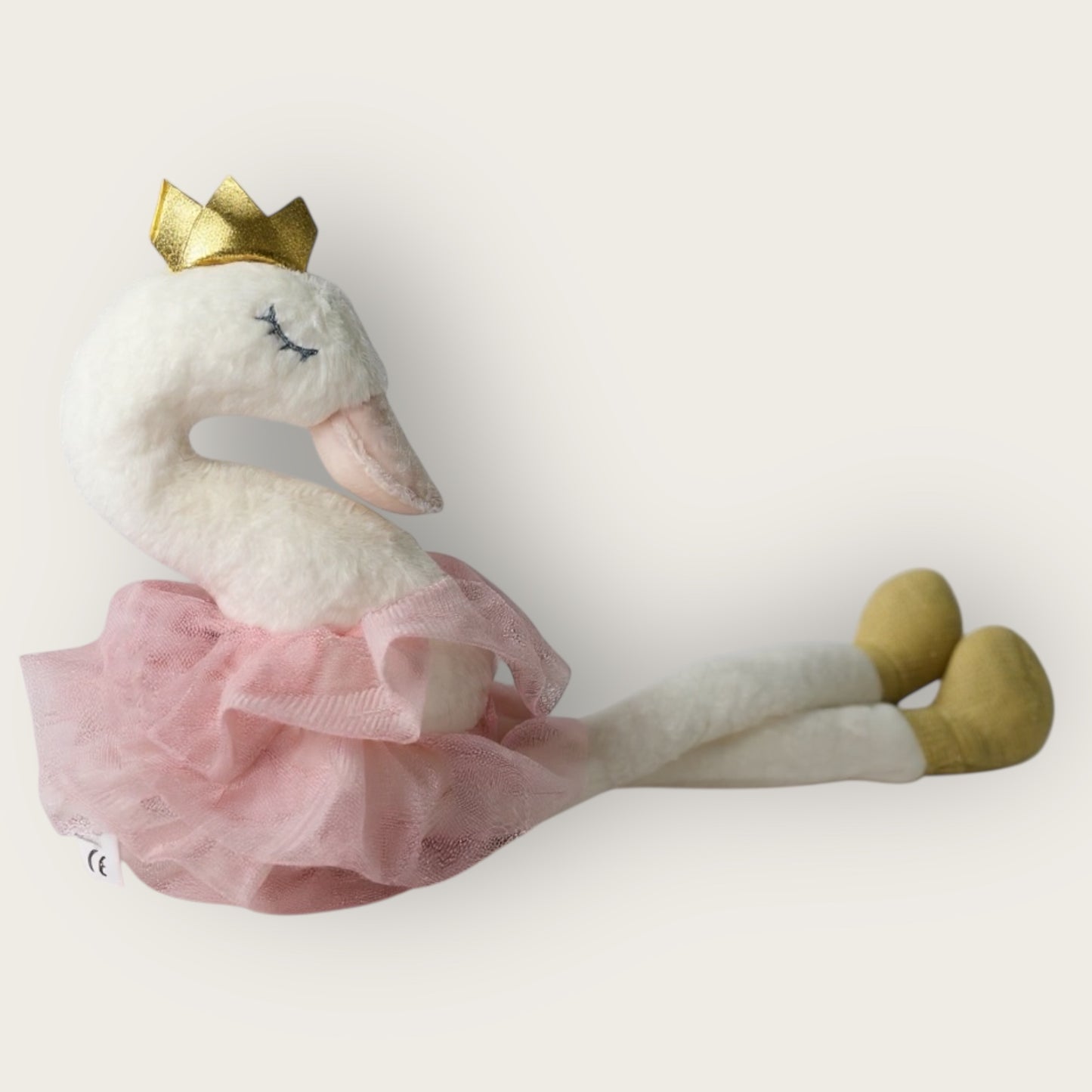 Soft swan plush toy with pink tulle skirt and gold crown, featured as a keepsake baby gift for newborn girls.