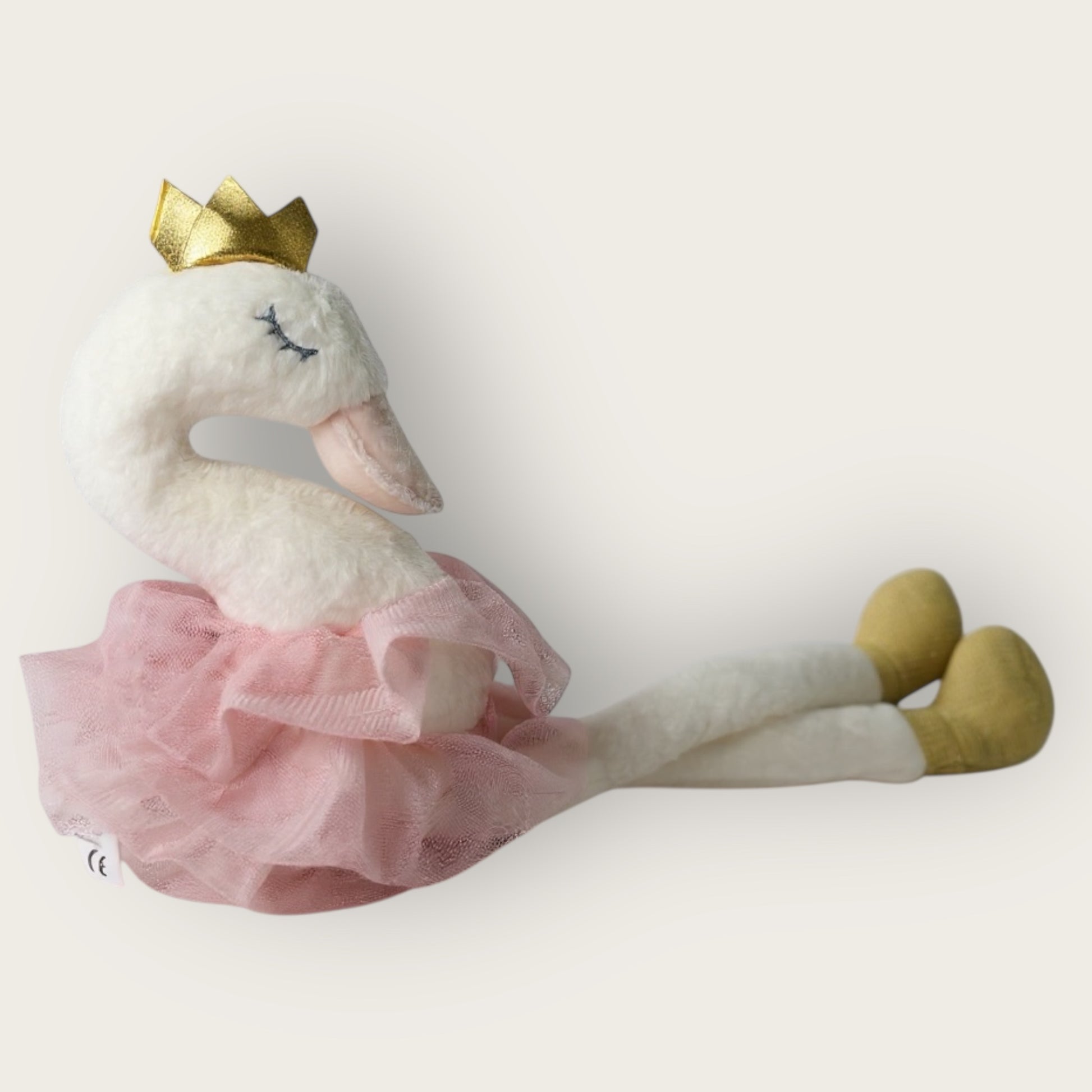 Soft swan plush toy with pink tulle skirt and gold crown, featured as a keepsake baby gift for newborn girls.