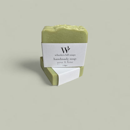 Handmade pine and lime artisan soap bar on a neutral background