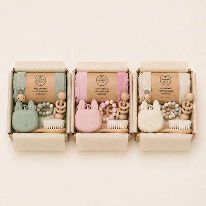Baby gift boxes in green, pink and beige colour options neutral babu hamper variations.