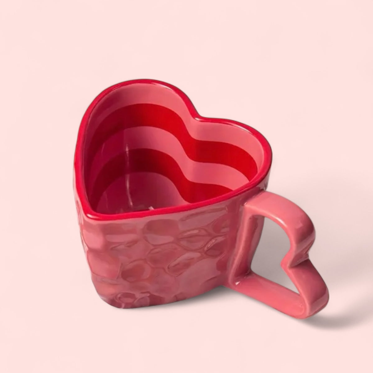 Red heart-shaped mug in a gift bag with ribbon and gold spoon | Wrap With Love
