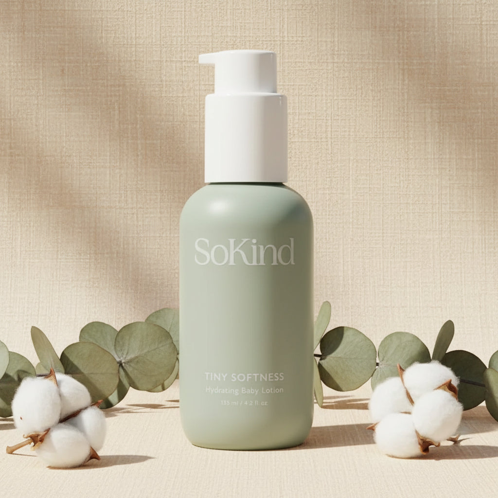 SoKind Tiny Softness hydrating baby lotion bottle in soft age green with white pump, displayed on a clean white background