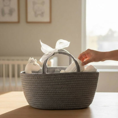 Neutral baby gift basket with swan plush and muslin blanket, ready to gift newborn